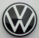 A set of original Volkswagen center caps