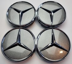 A set of original Mercedes A2204000125 center caps